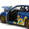 2012 Subaru Impreza WRX STI Blue Metallic with Graphics and Sonic The Hedgehog Diecast Figure “Sonic The Hedgehog” “Hollywood Rides” Series 1/24 Diecast Model Car by Jada