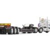 Peterbilt 367 Day Cab White “Komatsu” and Talbert 55SA Tri-Axle Lowboy Trailer Black 1/50 Diecast Model by First Gear