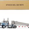 Peterbilt 389 Day Cab and ERMC 4-Axle Hydra-Steer Trailer with Bridge Beam Section Load White and Blue 1/64 Diecast Model by DCP/First Gear