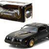 1980 Pontiac Firebird Trans Am T/A Turbo 4.9L Starlite Black with Golden Eagle Hood and Stripes 1/24 Diecast Model Car by Greenlight