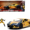 2020 Chevrolet Corvette C8 Stingray Gold Metallic and Dark Blue and Wolverine Diecast Figurine “X-Men” “Marvel” Series “Hollywood Rides” 1/24 Diecast Model Car by Jada