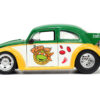 1959 Volkswagen Drag Beetle Green and Yellow and Michelangelo Diecast Figure “Teenage Mutant Ninja Turtles” “Hollywood Rides” Series 1/24 Diecast Model Car by Jada